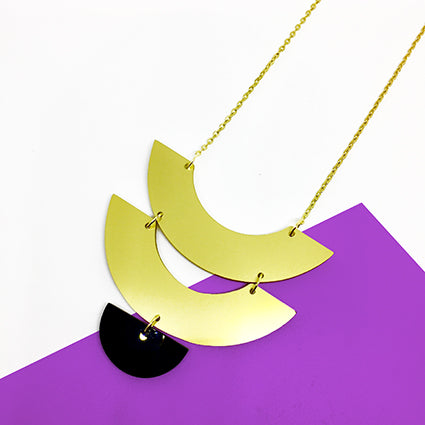 long-gold-geometric-crescent-necklace