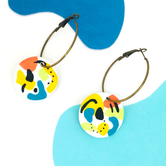 symbolic-hoop-pierced-earrings